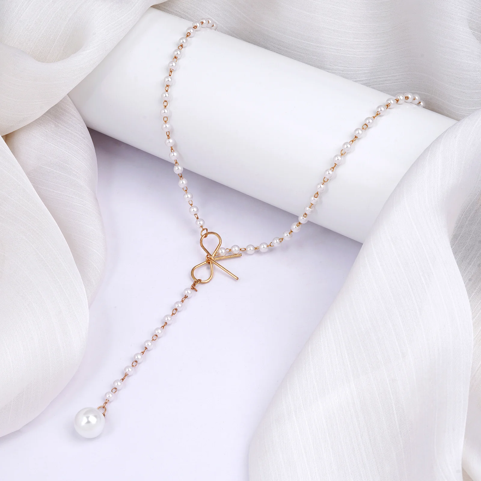 Bewitched Fizah's  Pearl and Gold Bow knot Necklace - Image 3