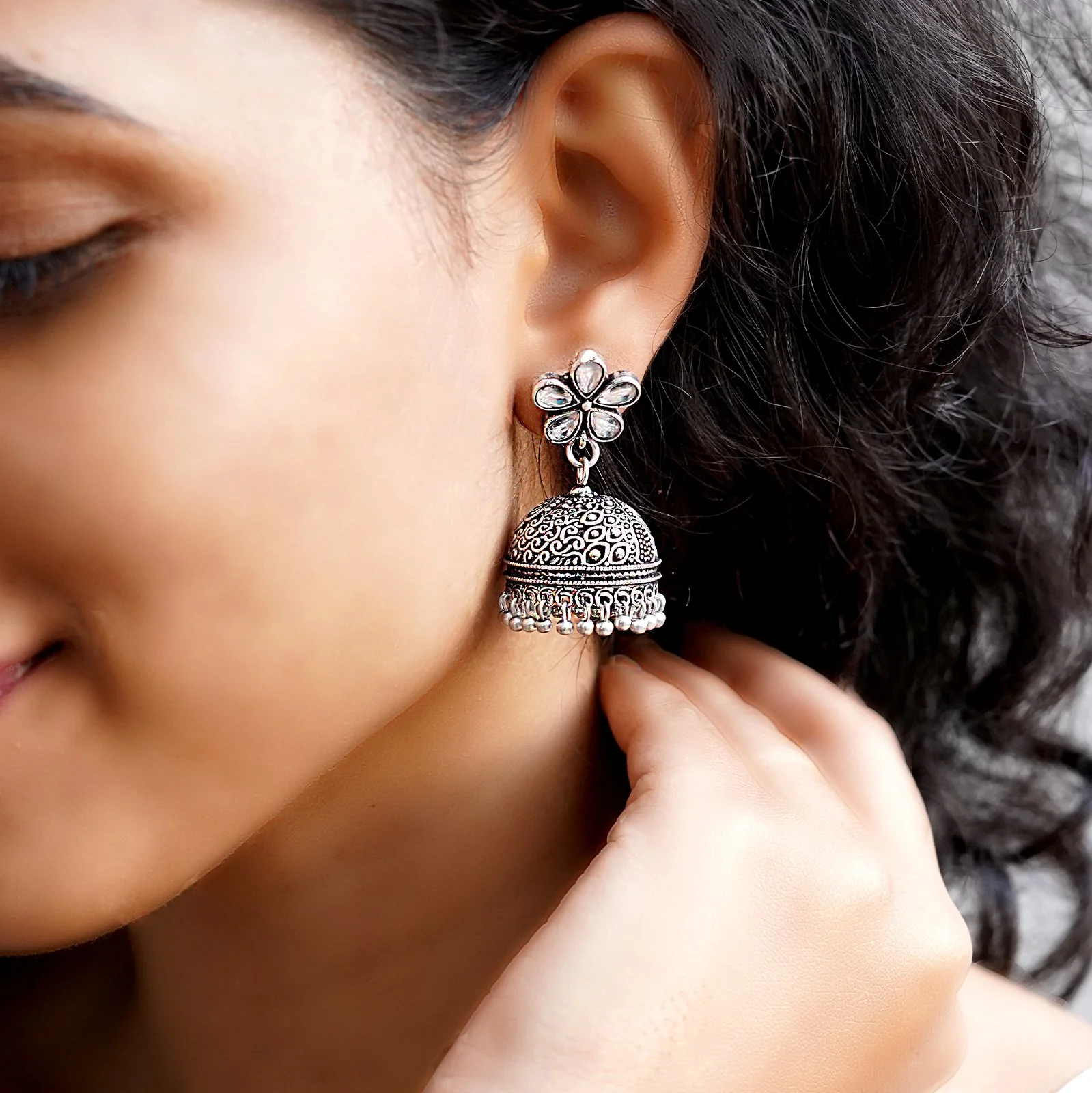 Teejh Floret Polki Silver Oxidized Pearl Jhumki Earrings - Image 2