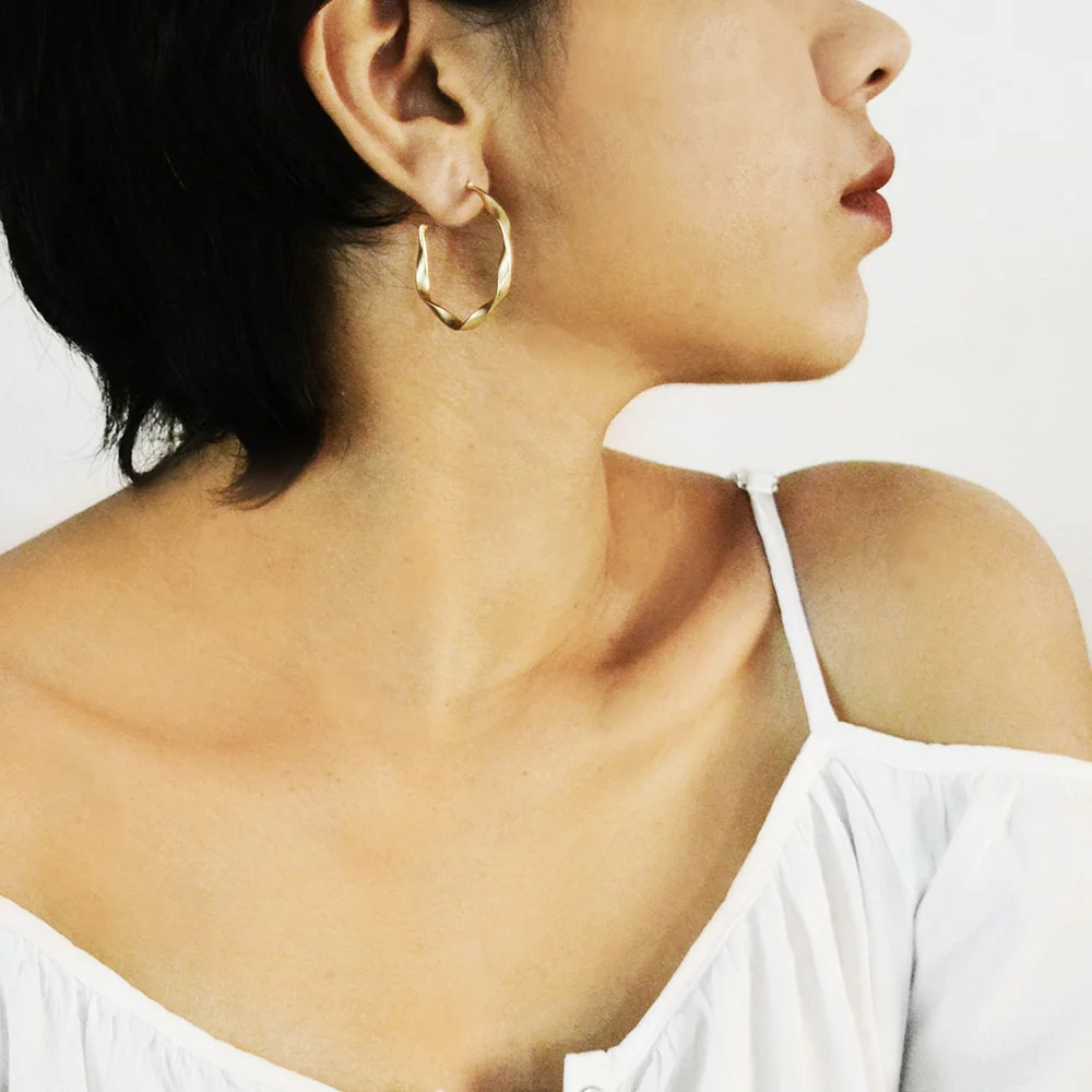 Twisted Gold Earrings - Image 4