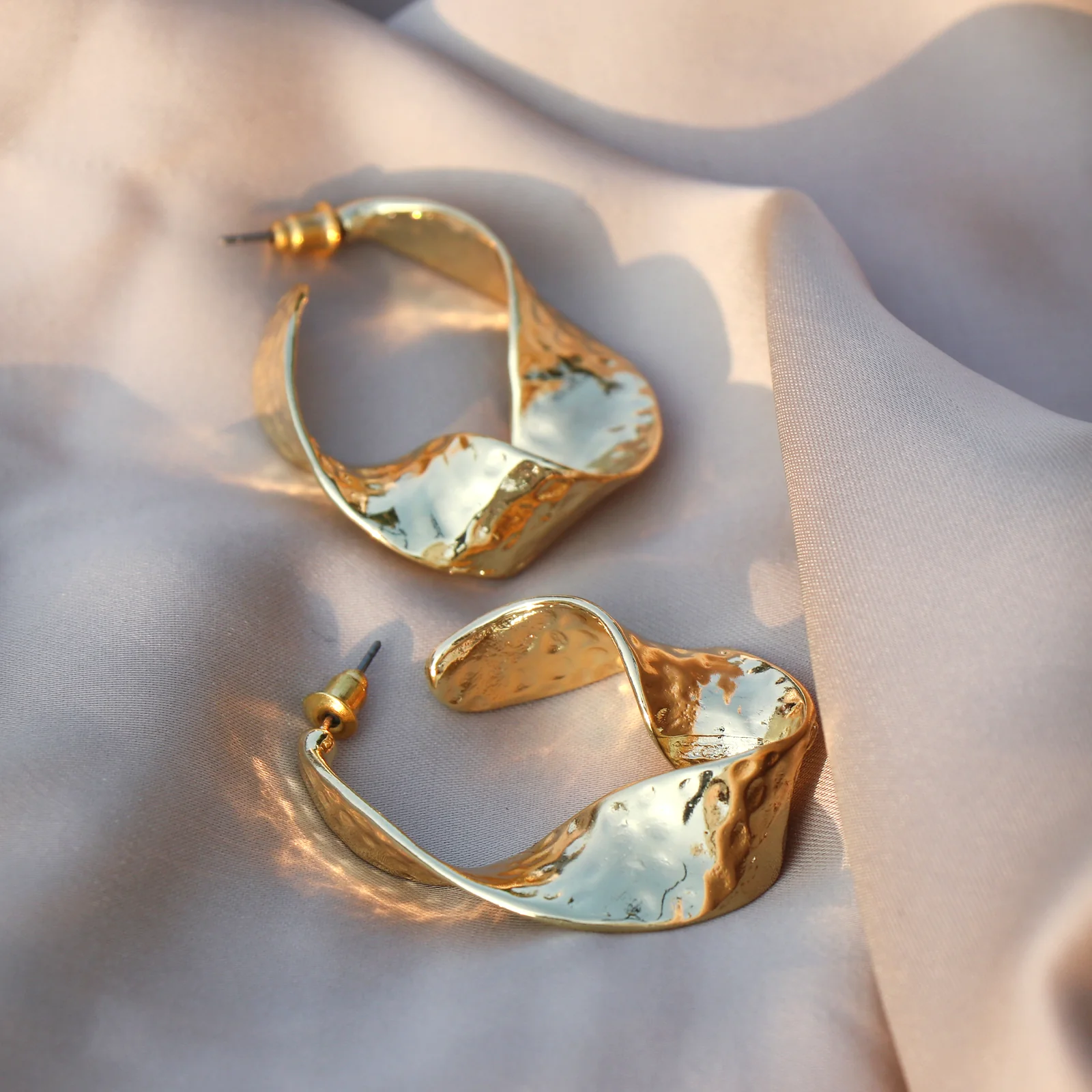 Twisted Hammered Bold Gold Earrings - Image 3